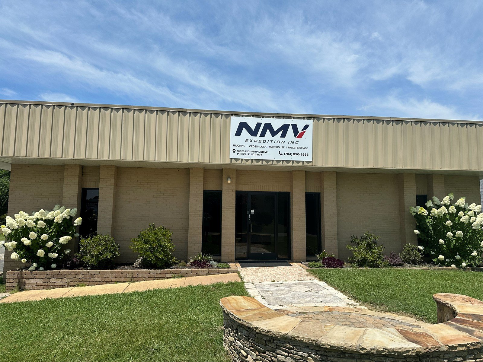 Front of the NMV Expedition Inc. building at 10020 Industrial Drive, Pineville, NC
