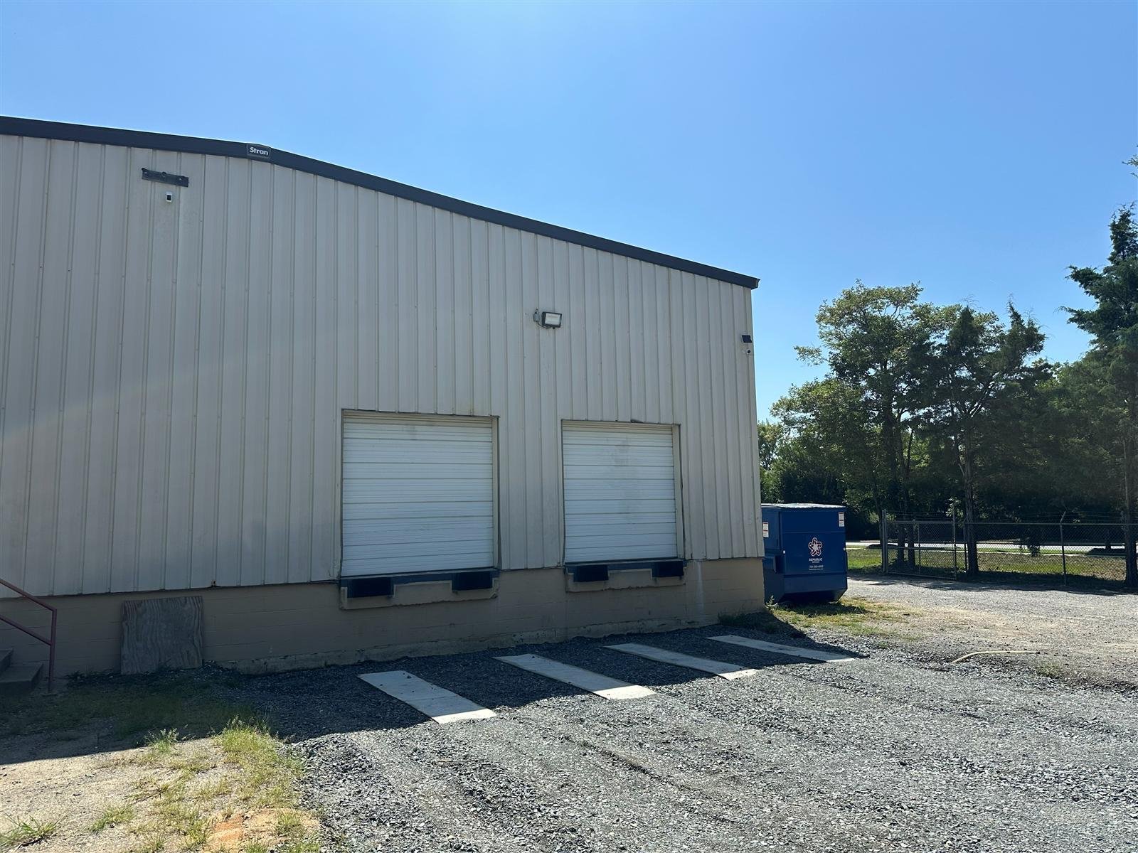 Dock doors at the NMV Expedition warehouse and cross-dock facility in Pineville, NC