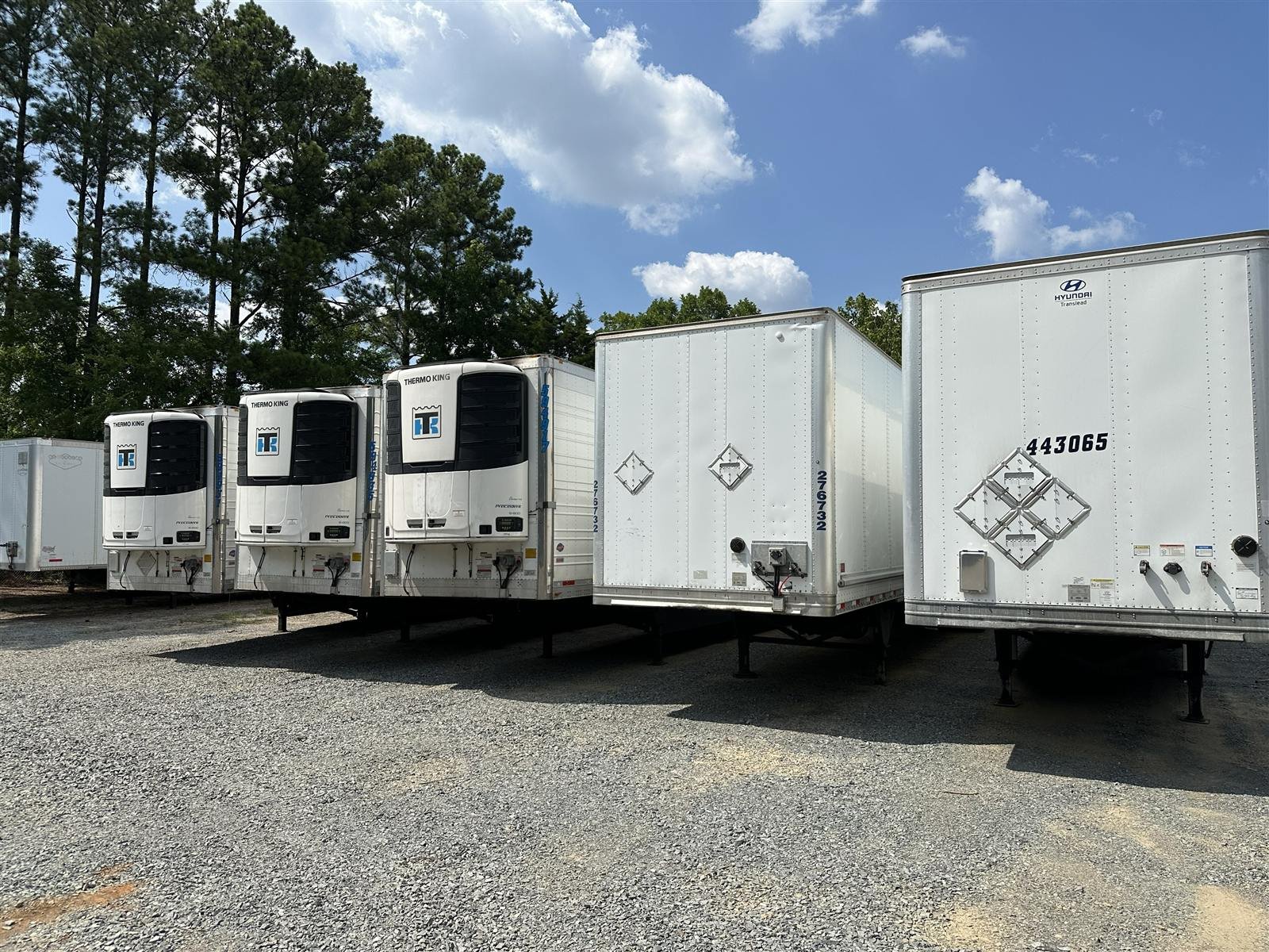 Row of refrigerated trailers with Thermo King units used for reefer storage at NMV Expedition in Pineville, NC